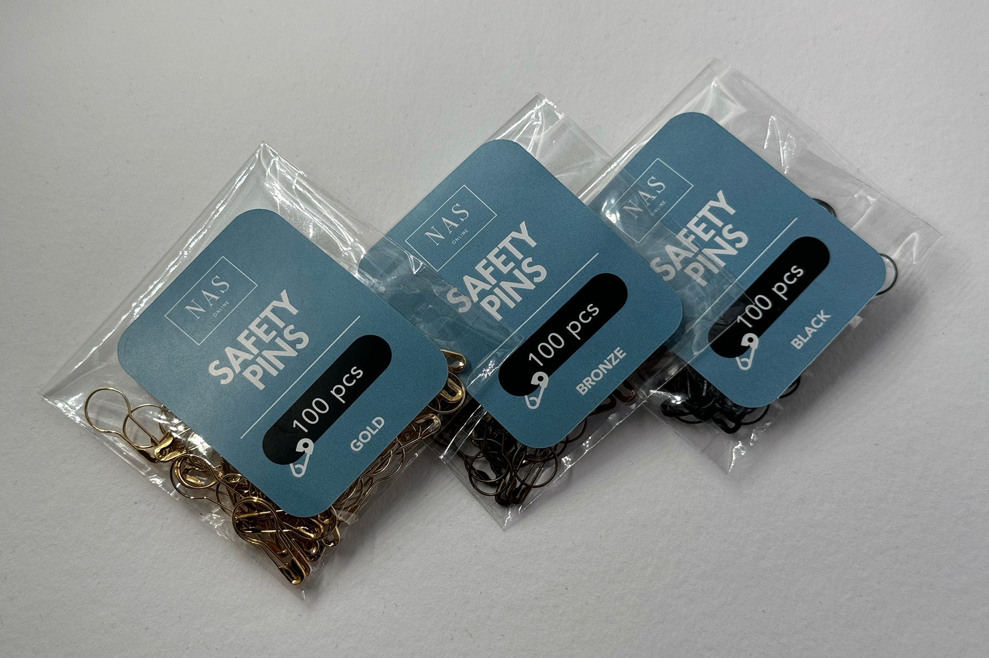 Security pins for cardboard tags โ NAS Online